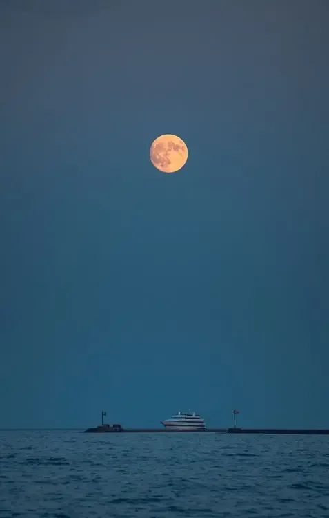 Calm sea under a full moon, the planet that rules Cancer