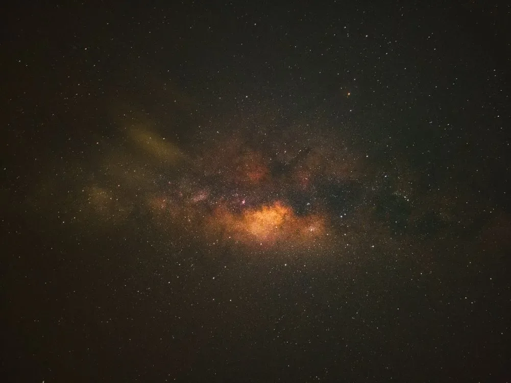 A star-filled night sky with the Milky Way visible