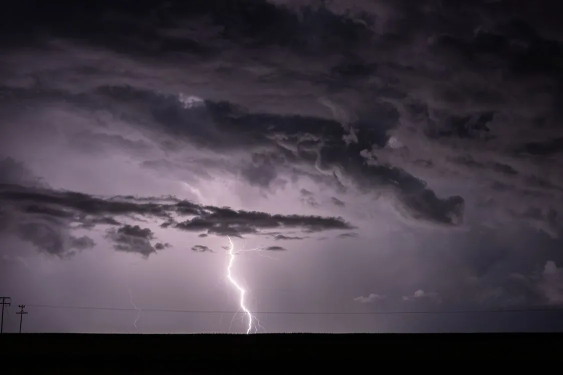 Lightning splitting a night sky, an image of sudden change