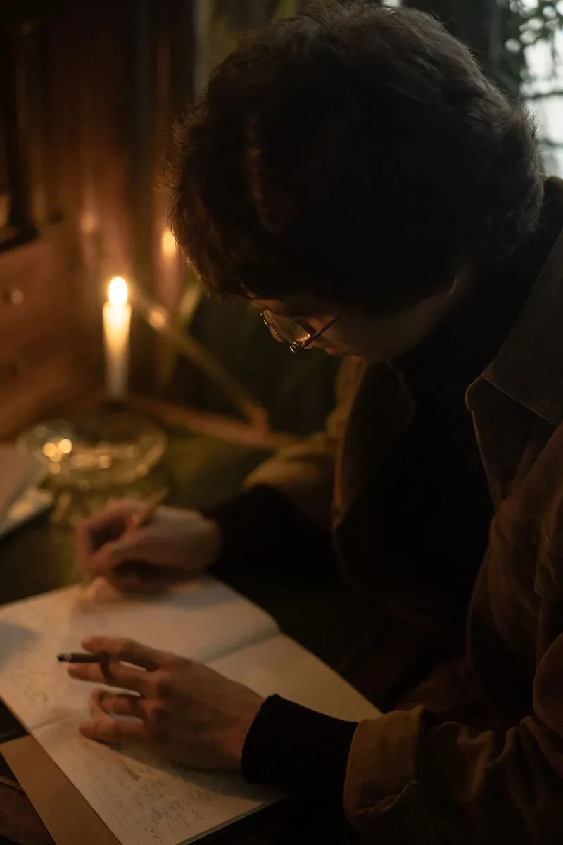 Writing by candlelight as a quiet moment of personal reflection